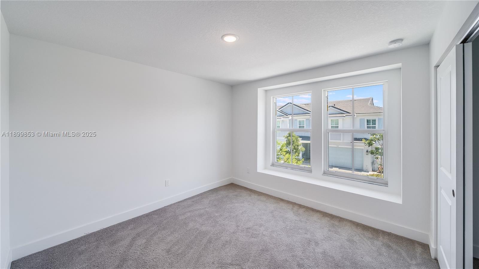 241 Preserve Trail North Stuart, FL 34994 - Photo 29 of 37 an empty room with windows