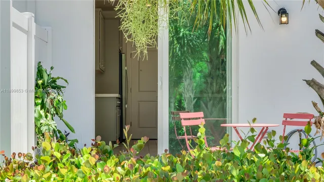 a view of an house with backyard space and porch