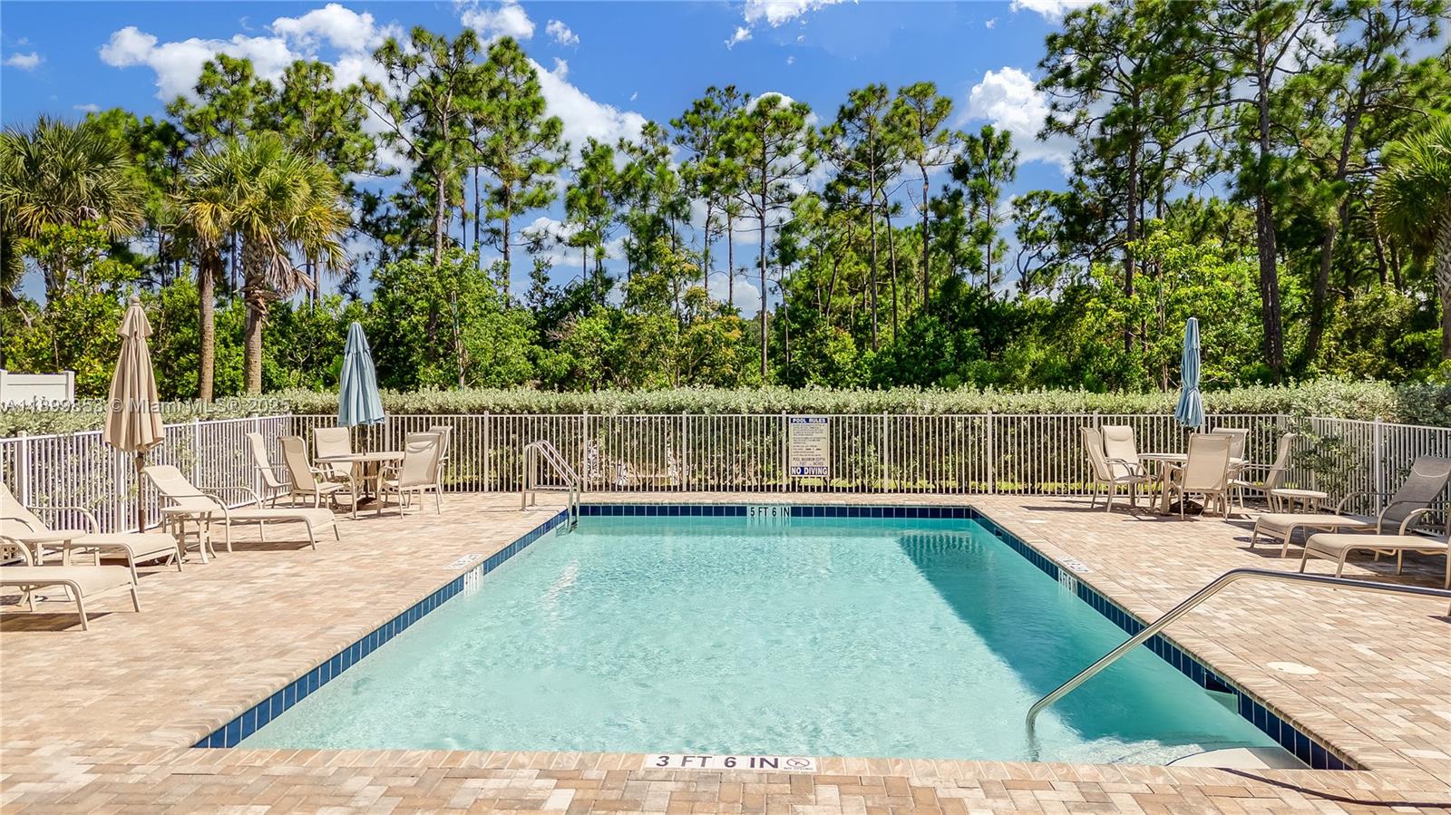 241 Preserve Trail North Stuart, FL 34994 - Photo 34 of 37 swimming pool view with a seating space