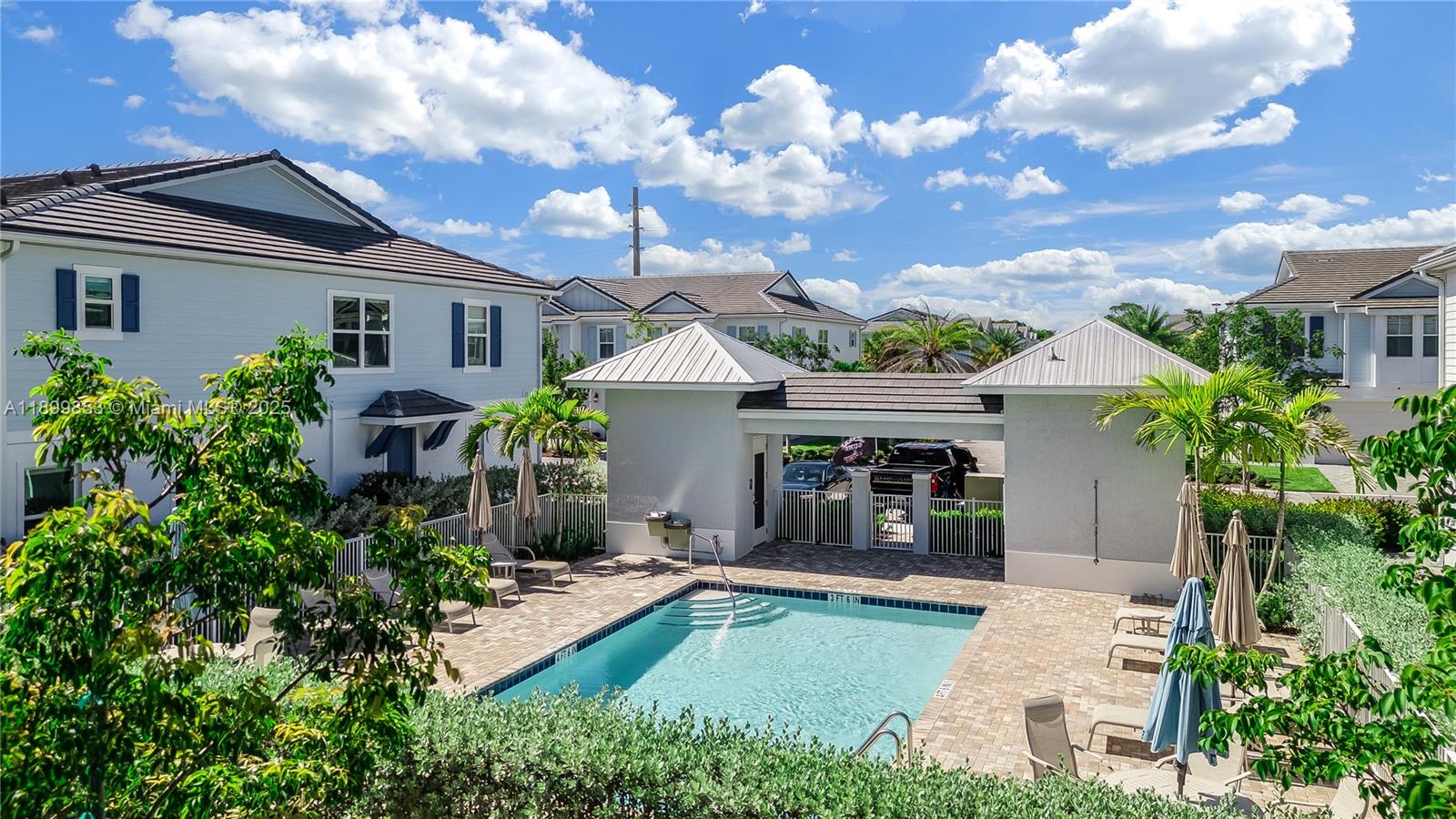 241 Preserve Trail North Stuart, FL 34994 - Photo 35 of 37 a front view of a house with garden