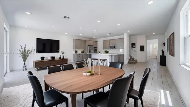 a view of a dining room with furniture