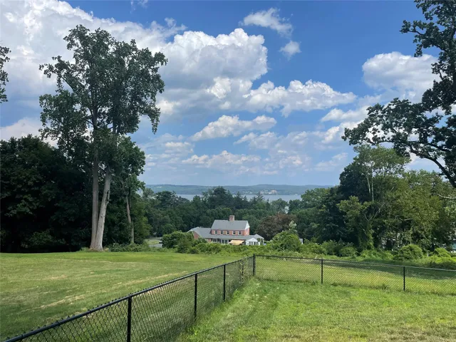 a view of a golf course with a lake