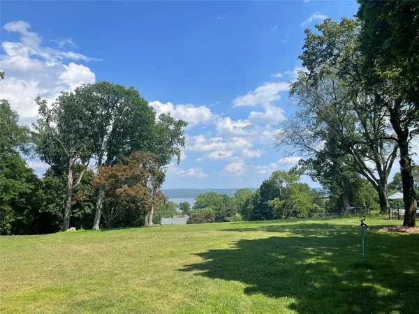 a view of outdoor space with swimming pool and furniture