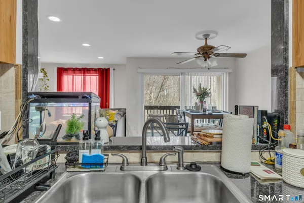 a view of a living room and a window
