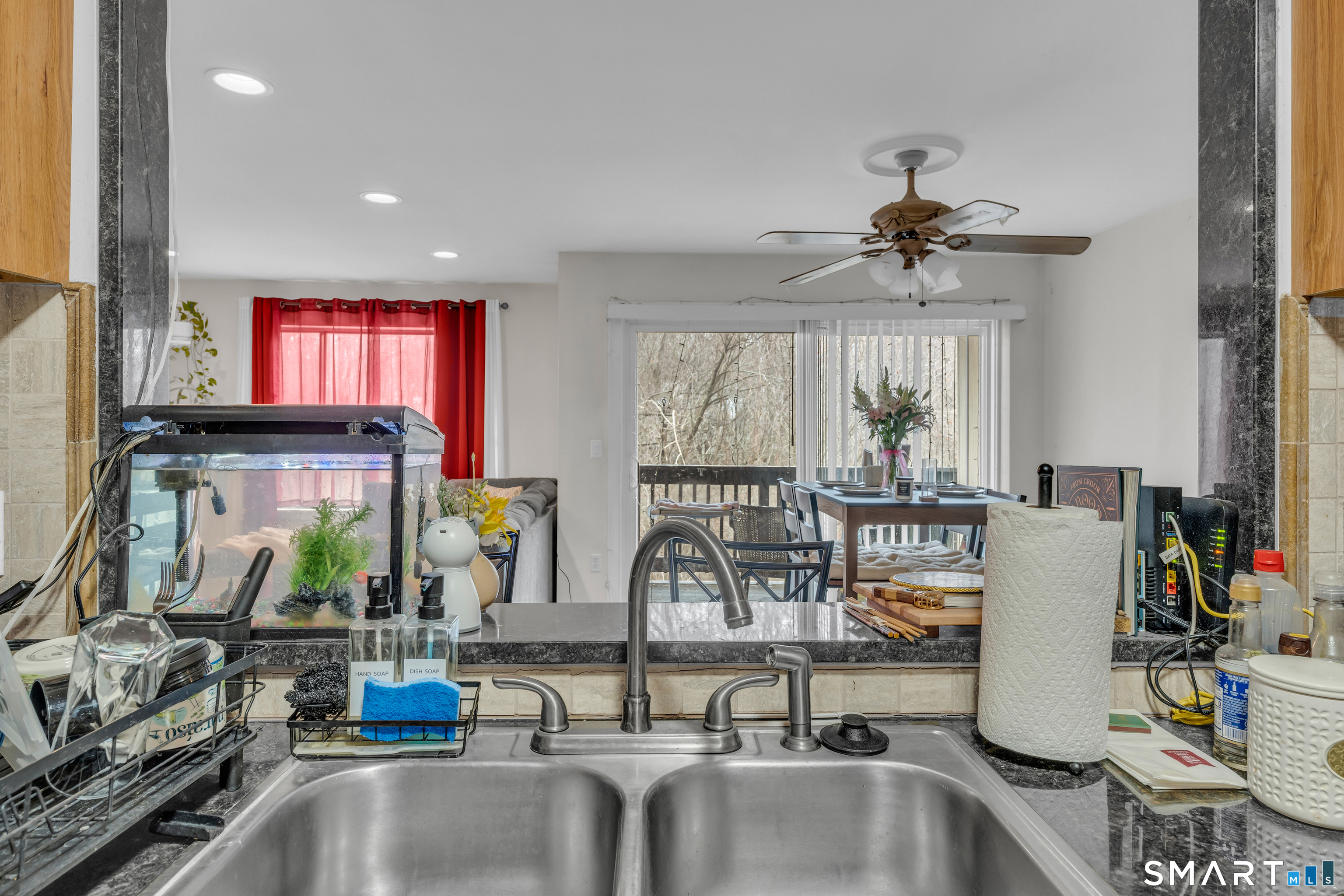175 Mill Pond Road, Unit 444 Hamden, CT 06514 - Photo 12 of 38 a view of a living room and a window