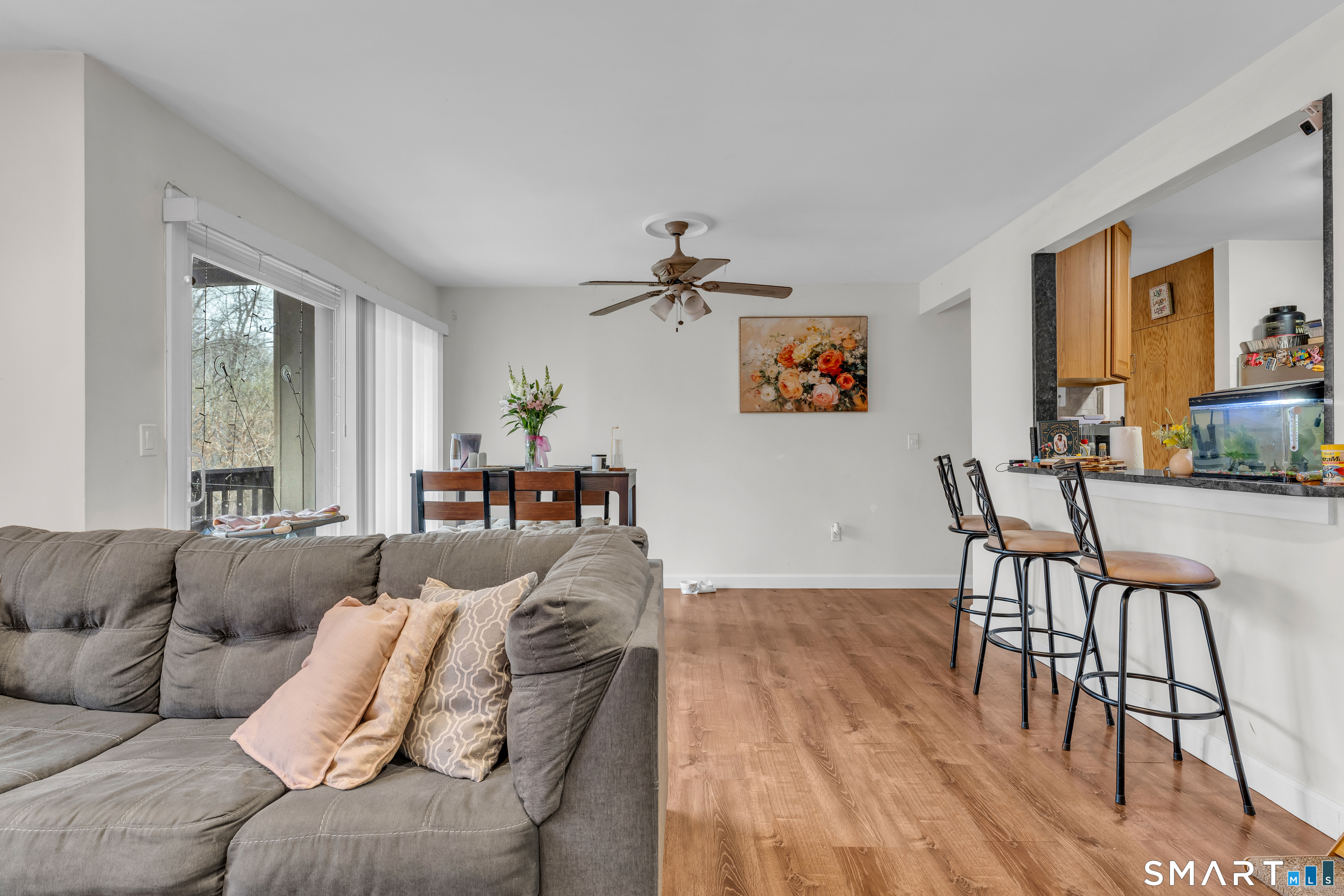 175 Mill Pond Road, Unit 444 Hamden, CT 06514 - Photo 15 of 38 a living room with furniture and a large window