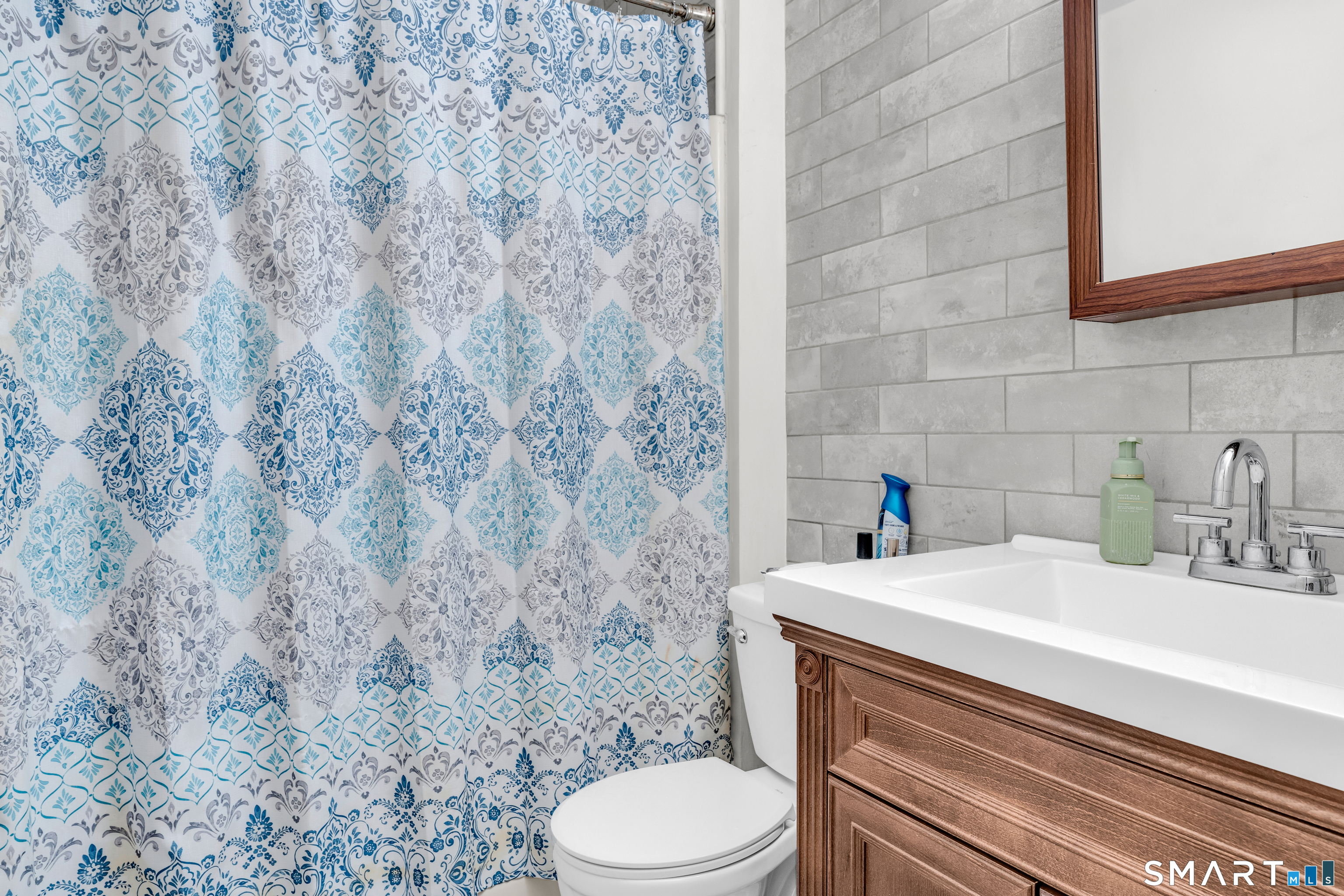 175 Mill Pond Road, Unit 444 Hamden, CT 06514 - Photo 21 of 38 a bathroom with a sink and a toilet