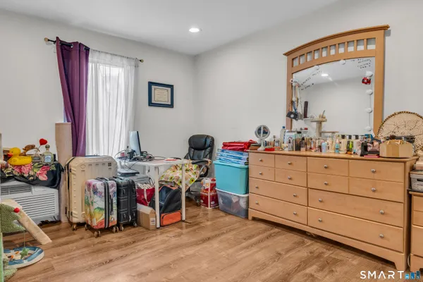 a view of a workspace with furniture