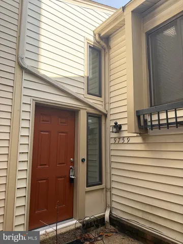a view of a balcony with a door