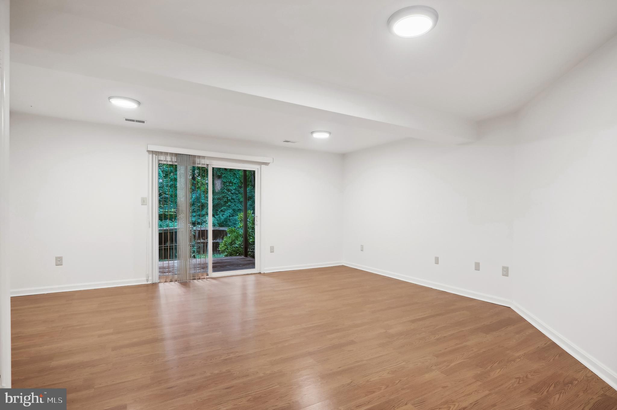 103 Kinsman View Circle Silver Spring, MD 20901 - Photo 21 of 24 Lower Level view to walk-out deck