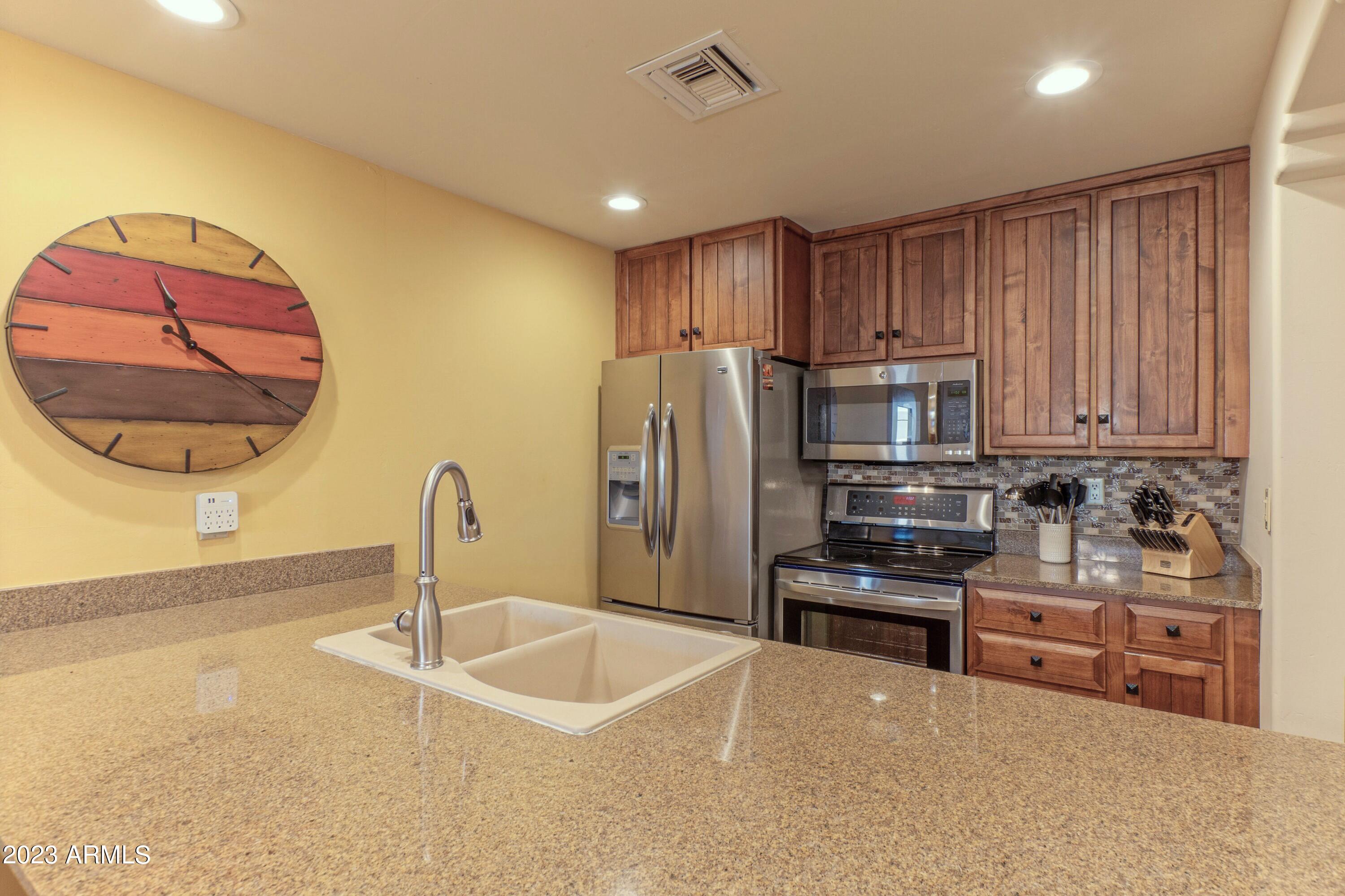 36601 North Mule Train Road, Unit C37 Carefree, AZ 85377 - Photo 11 of 35 Beautiful Granite & Alderwood