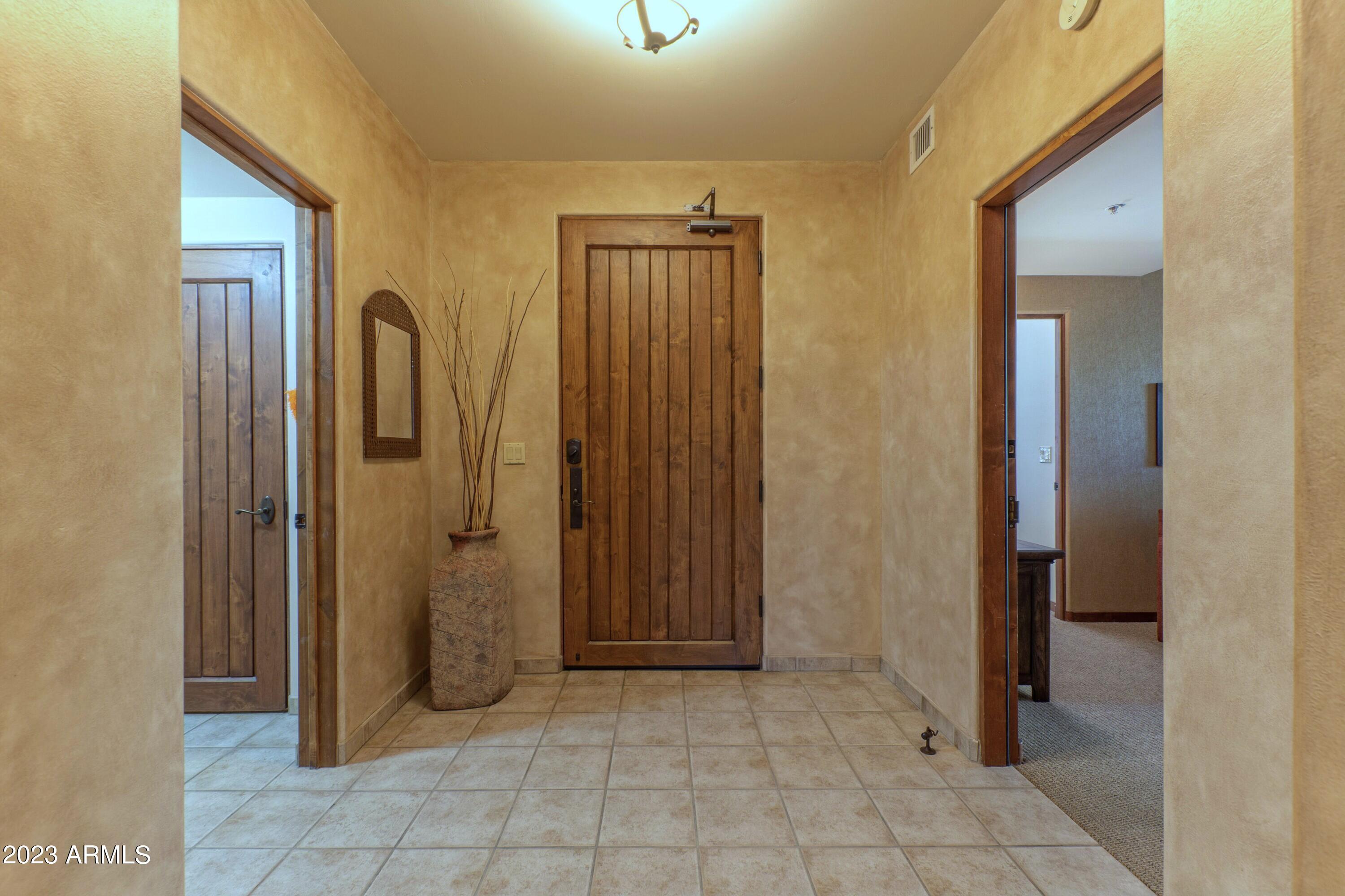 36601 North Mule Train Road, Unit C37 Carefree, AZ 85377 - Photo 3 of 35 Foyer & 2nd Master Entry on Left