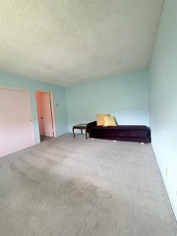 a kitchen with a sink and a cabinet