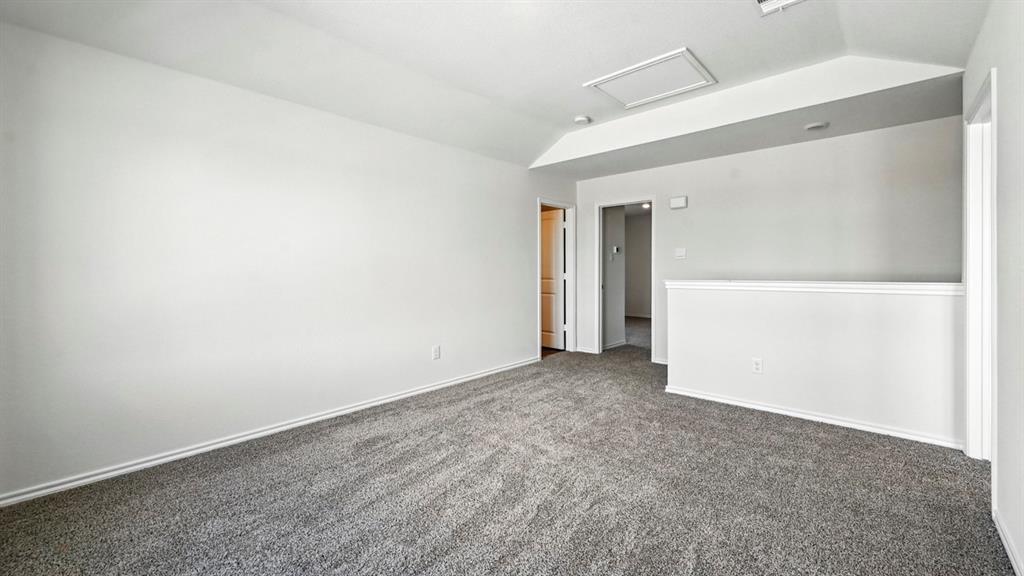 122 Pheasant Run Road Terrell, TX 75160 - Photo 23 of 36 Spacious room featuring neutral carpeting, light-colored walls, and a white ceiling