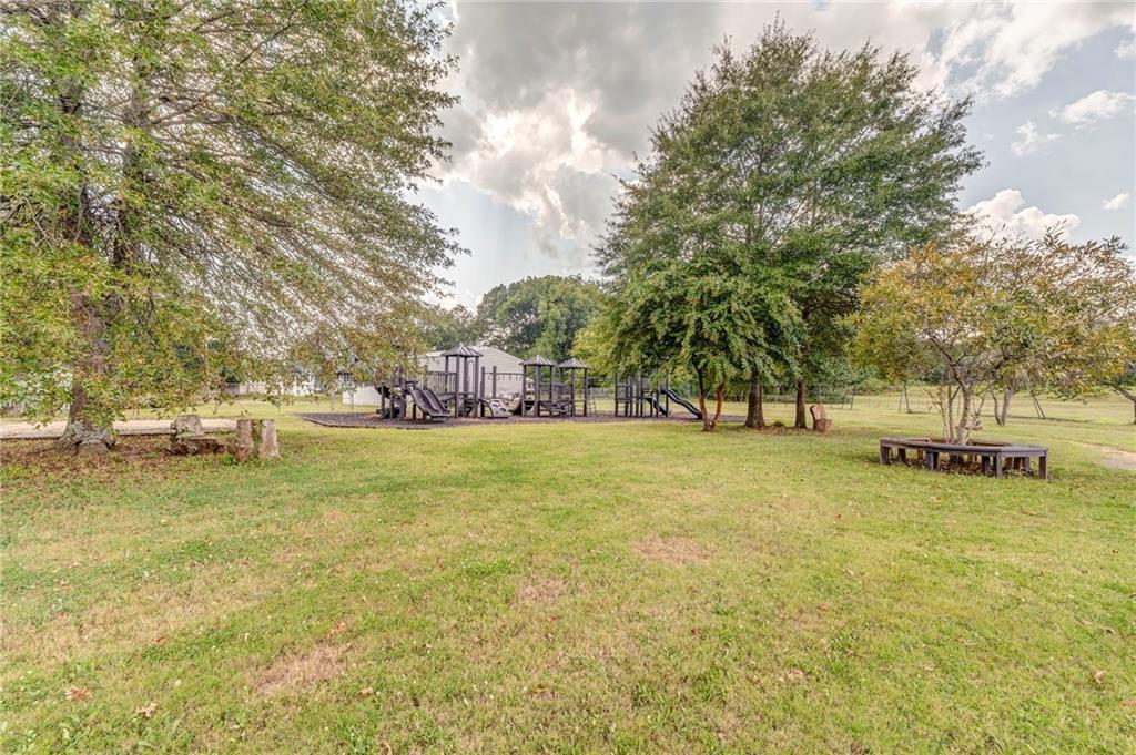 13 Rome Street Cave Spring, GA 30124 - Photo 52 of 55 a view of yard with swimming pool and trees