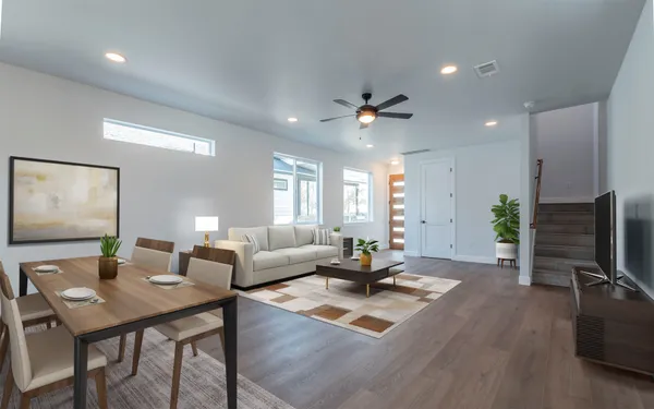 a living room with furniture fireplace and a flat screen tv