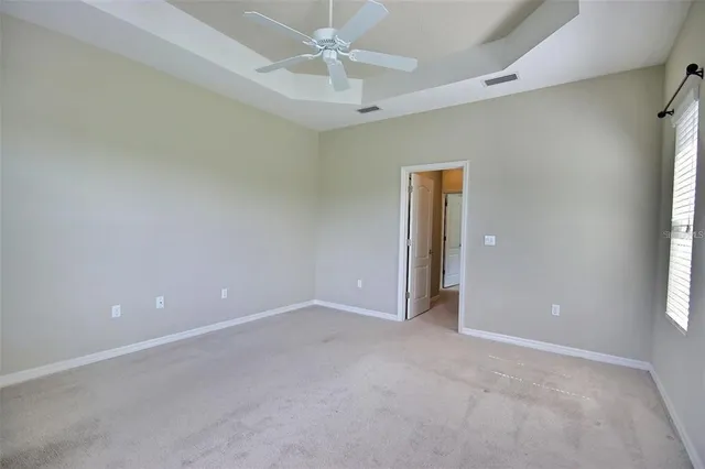 a bathroom with a double vanity sink and mirror