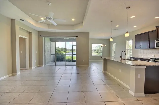 a view of an entryway with a floor to ceiling window