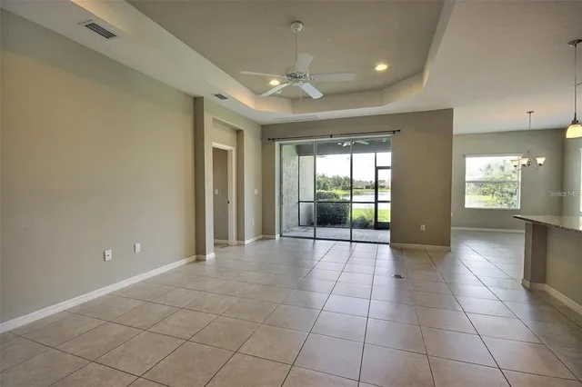 a view of a lake with houses in the back