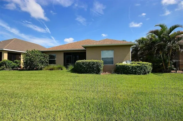 a view of a chairs and table in a patio