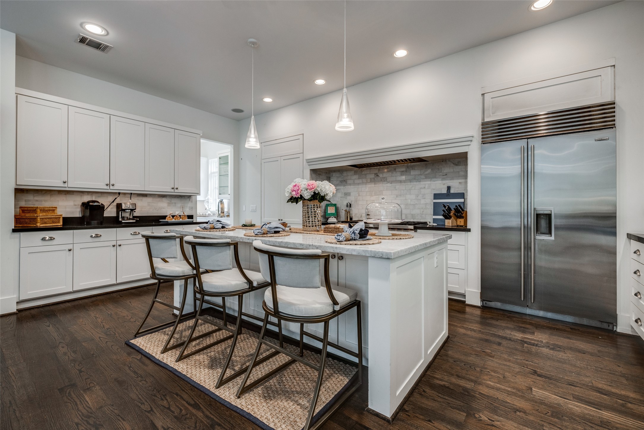 2815 Albans Road Houston, TX 77005 - Photo 18 of 50 A culinary haven with a Wolf 6-burner gas range & double oven, perfect for gourmet cooking.