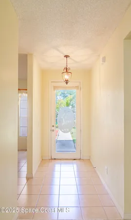 a kitchen with a sink a stove and cabinets