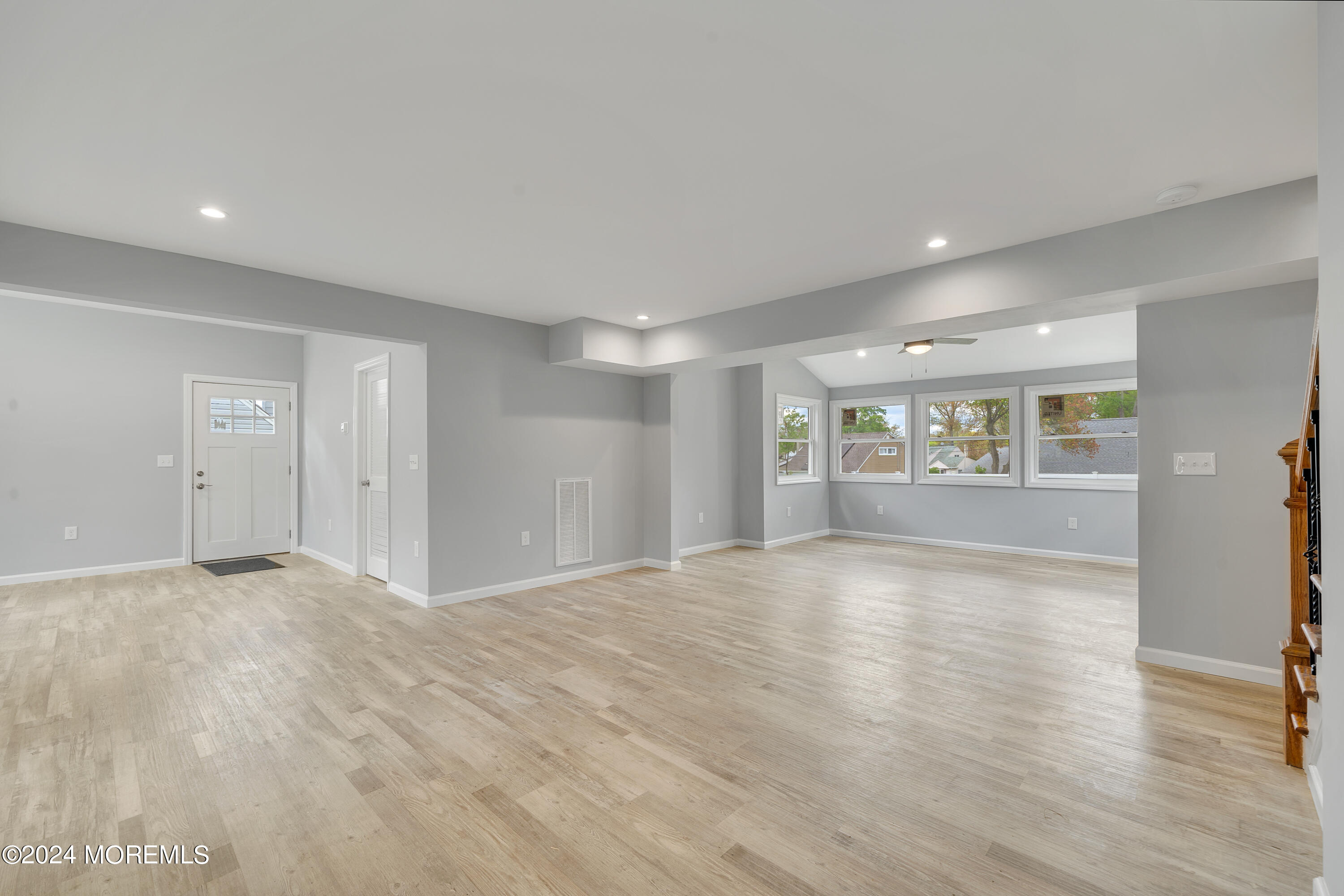 36 Pine Tree Road Old Bridge, NJ 08857 - Photo 17 of 34 a view of an empty room with wooden floor and a window