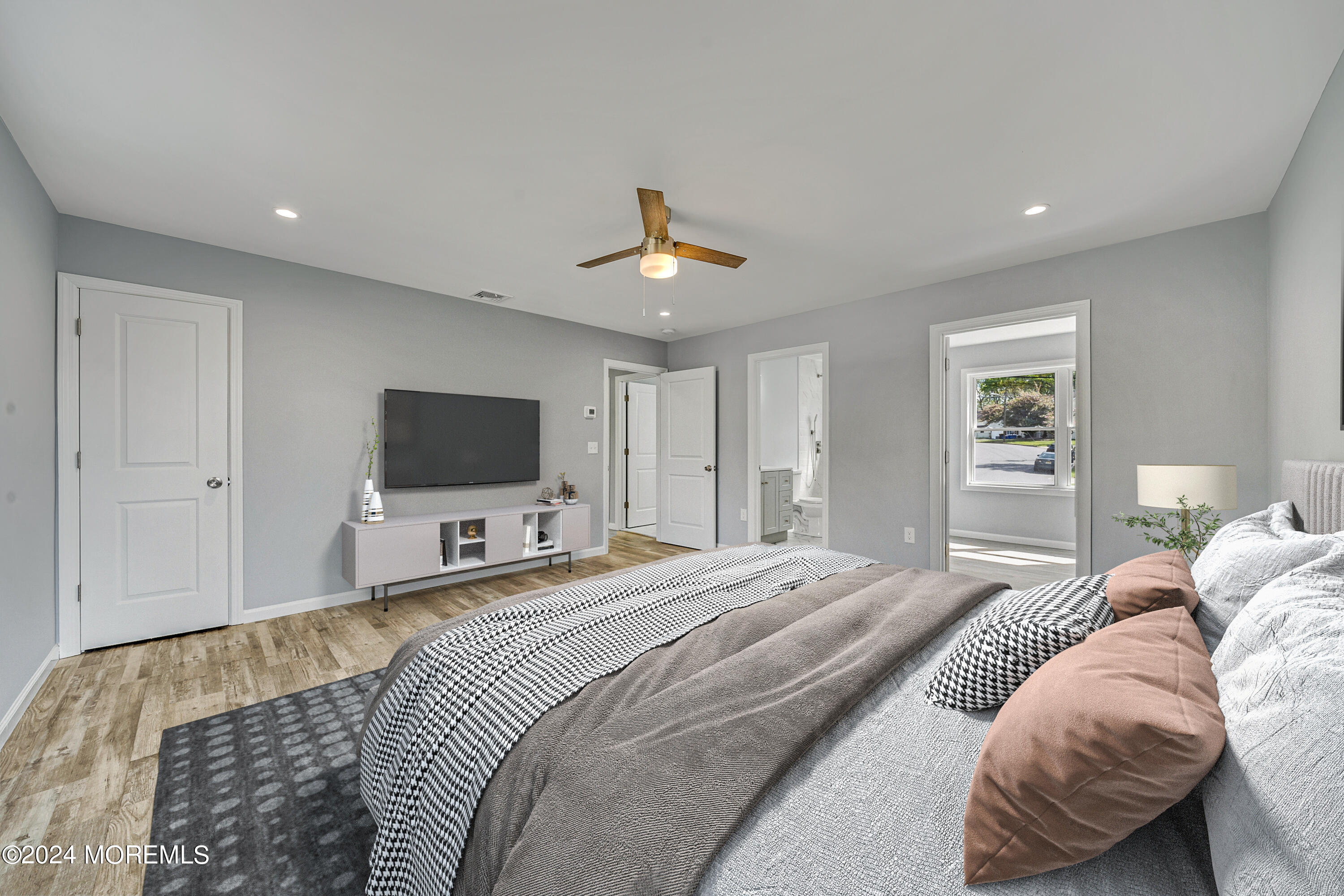 36 Pine Tree Road Old Bridge, NJ 08857 - Photo 33 of 34 a bedroom with a bed and a flat screen tv