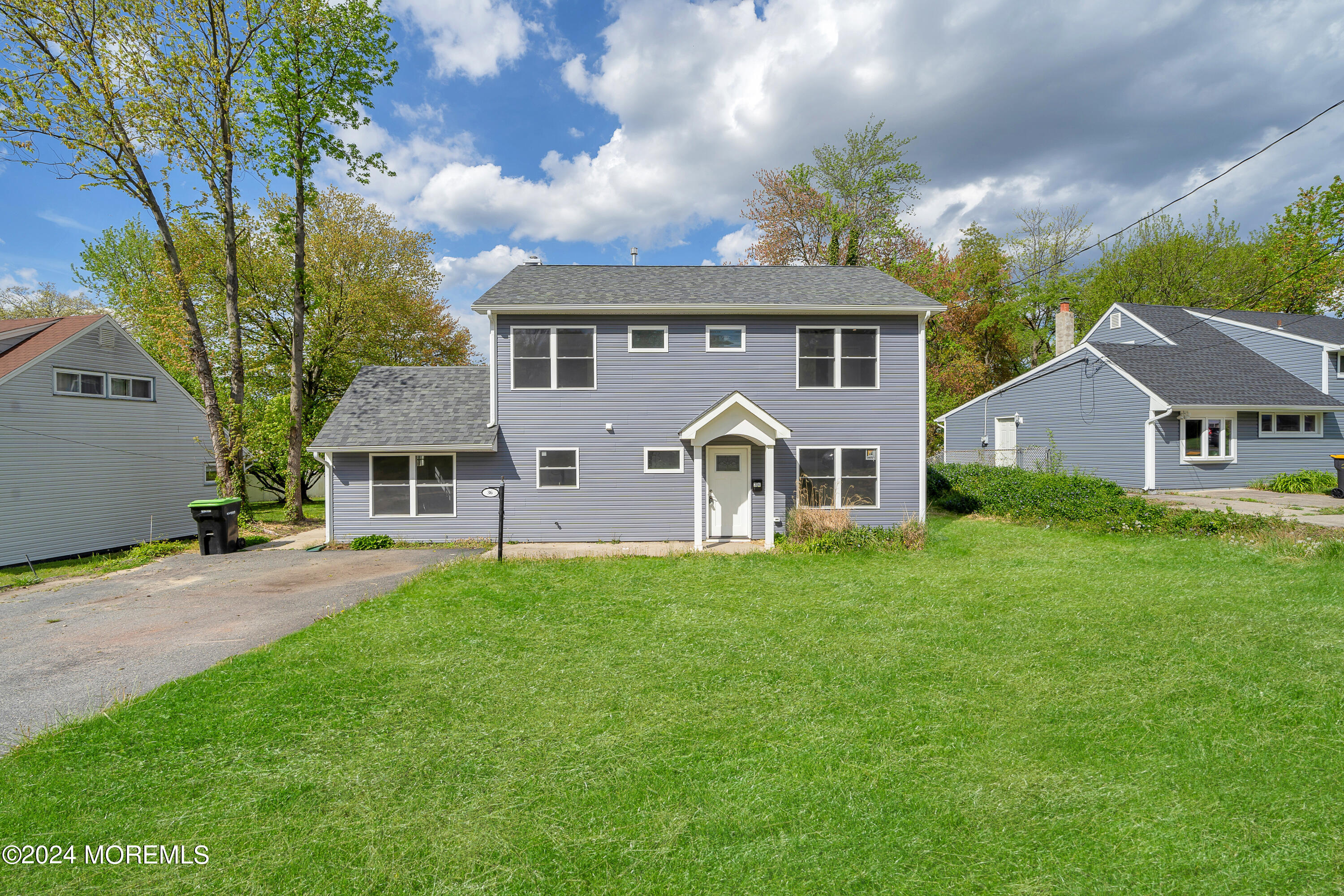 36 Pine Tree Road Old Bridge, NJ 08857 - Photo 6 of 34 front view of a house with a big yard