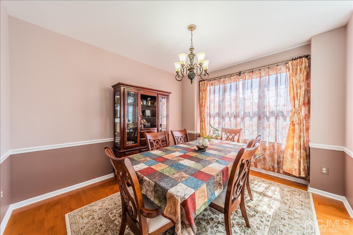 46 Potomac Road Monmouth Junction, NJ 08852 - Photo 11 of 42 a view of a dining room with furniture and window
