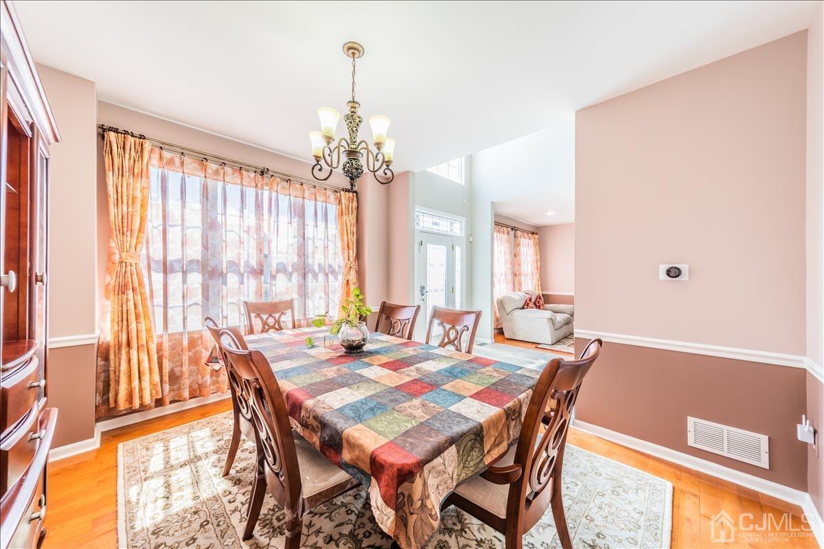 46 Potomac Road Monmouth Junction, NJ 08852 - Photo 12 of 42 a view of a dining room with furniture window and outside view