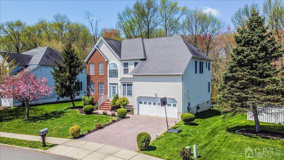 46 Potomac Road Monmouth Junction, NJ 08852 - Photo 3 of 42 a aerial view of a house with garden