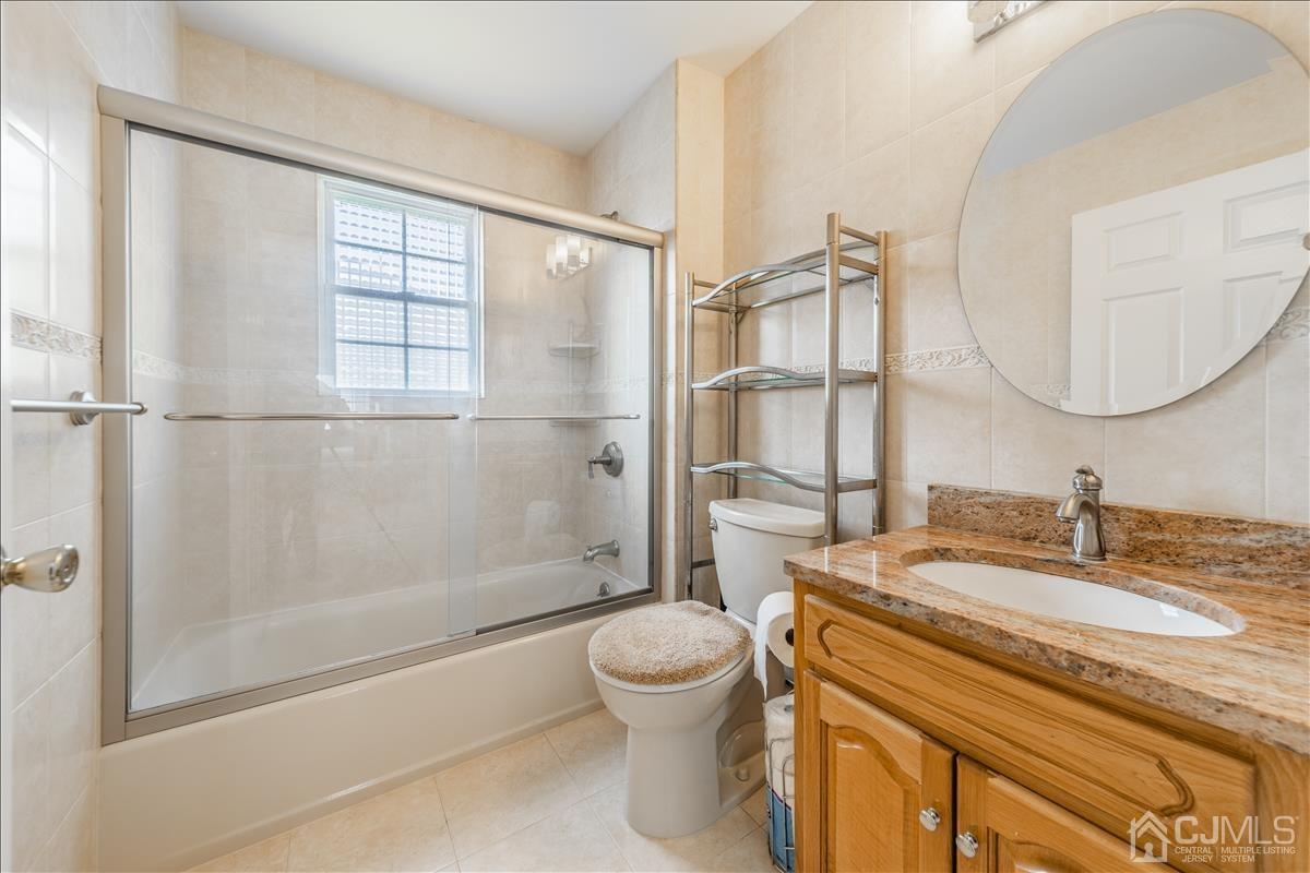 46 Potomac Road Monmouth Junction, NJ 08852 - Photo 33 of 42 a bathroom with a sink toilet and shower