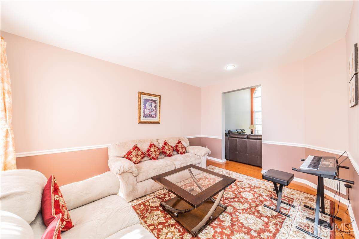 46 Potomac Road Monmouth Junction, NJ 08852 - Photo 5 of 42 a living room with furniture and wooden floor