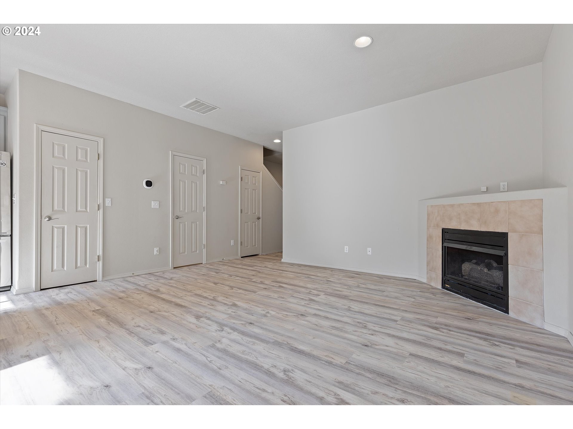 3181 Southwest 177th Place Beaverton, OR 97003 - Photo 13 of 31 a view of empty room with wooden floor