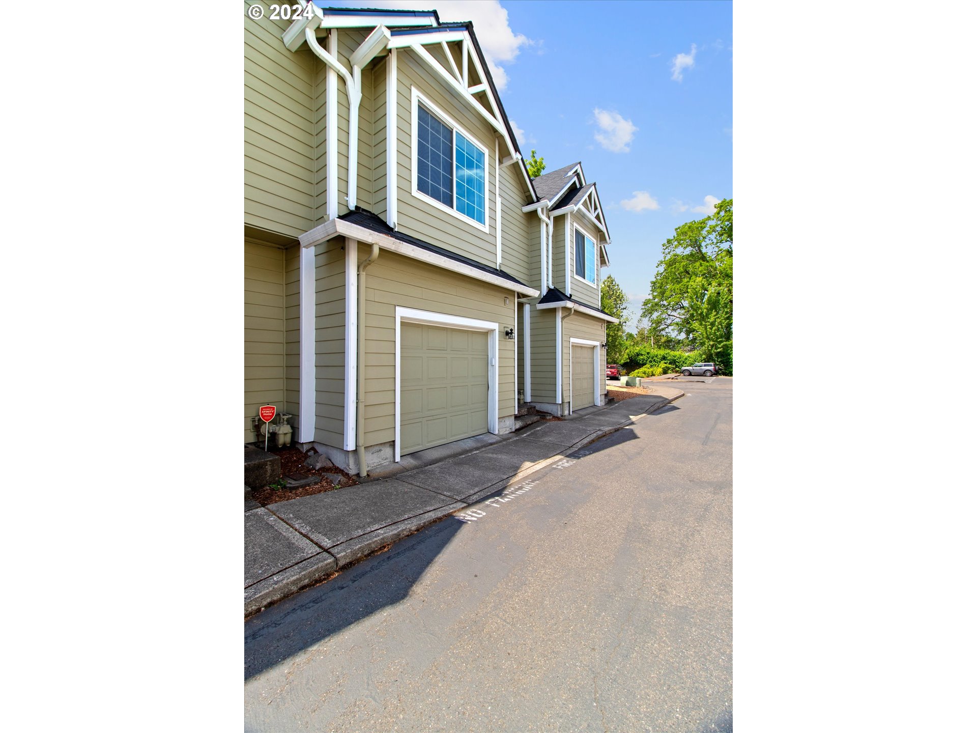 3181 Southwest 177th Place Beaverton, OR 97003 - Photo 2 of 31 a view of a street with house