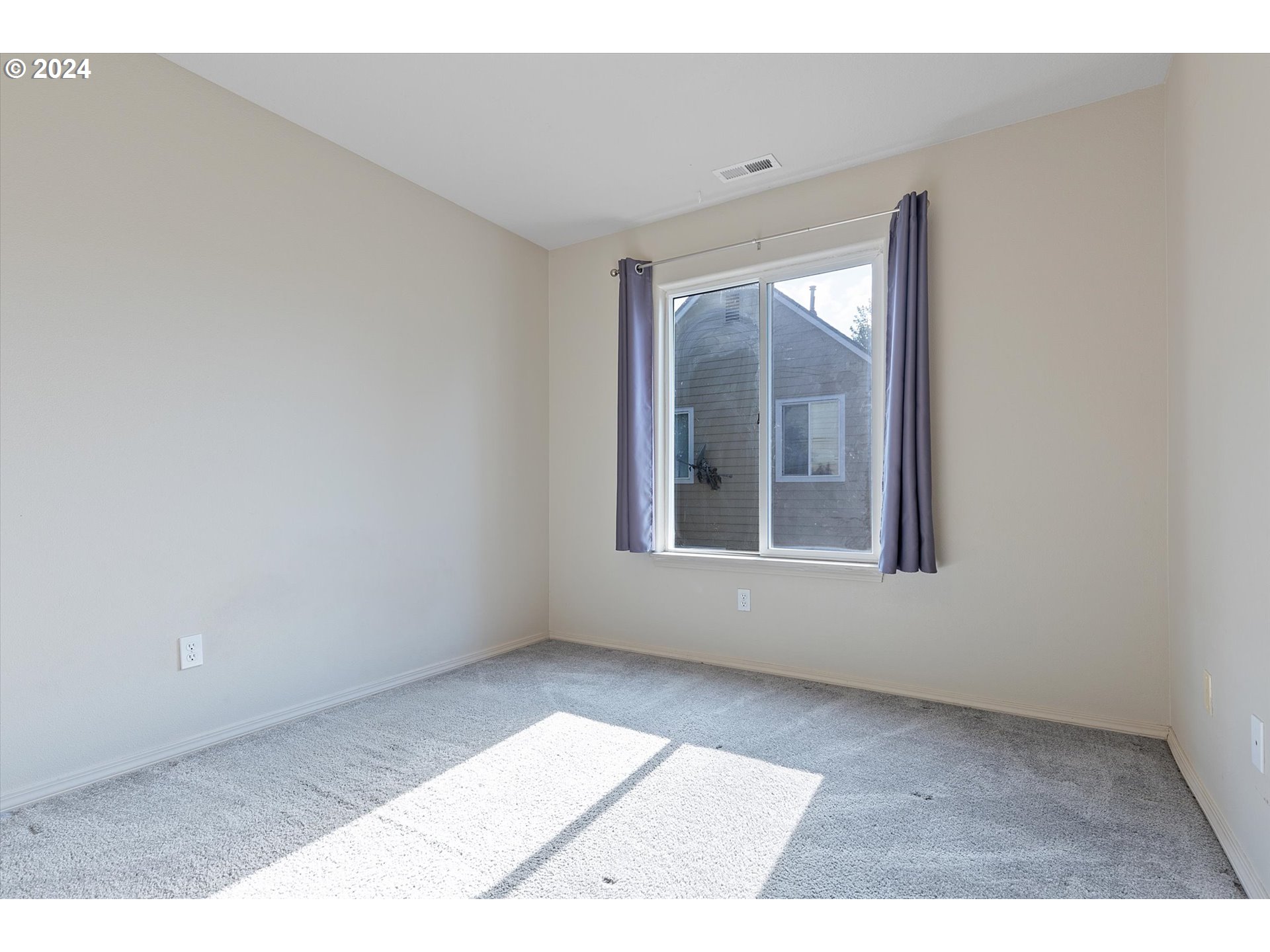 3181 Southwest 177th Place Beaverton, OR 97003 - Photo 22 of 31 a view of an empty room with a window