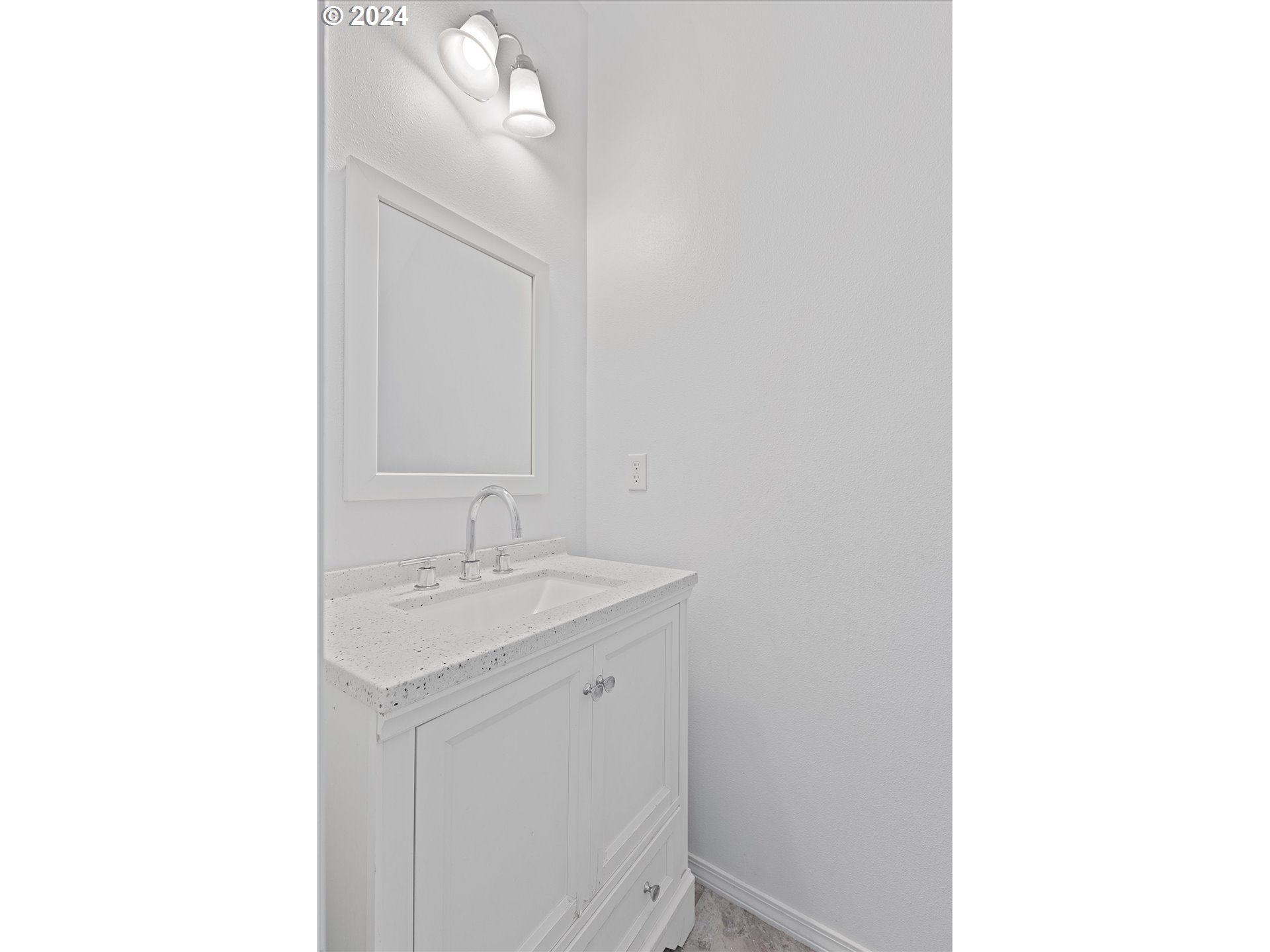 3181 Southwest 177th Place Beaverton, OR 97003 - Photo 8 of 31 a bathroom with a sink and a mirror