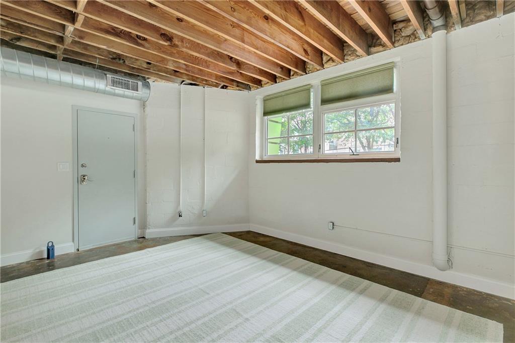 172 Carroll Street Southeast, Unit 103 Atlanta, GA 30312 - Photo 6 of 23 a view of room with window