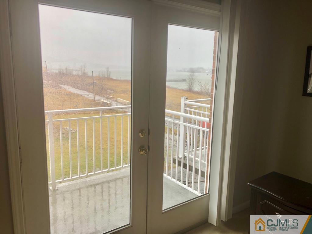 368 Rector Street, Unit 404 Perth Amboy, NJ 08861 - Photo 4 of 11 a view of an empty room with a window