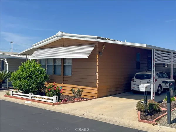a front view of a house with garage