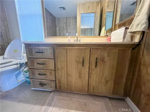 a view of a kitchen with a sink