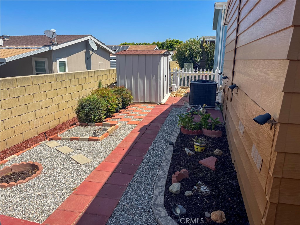 3500 Buchanan Street, Unit 24 Riverside, CA 92503 - Photo 5 of 28 a front view of a house with a yard