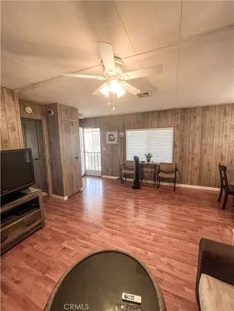 a view of a living room and kitchen floor