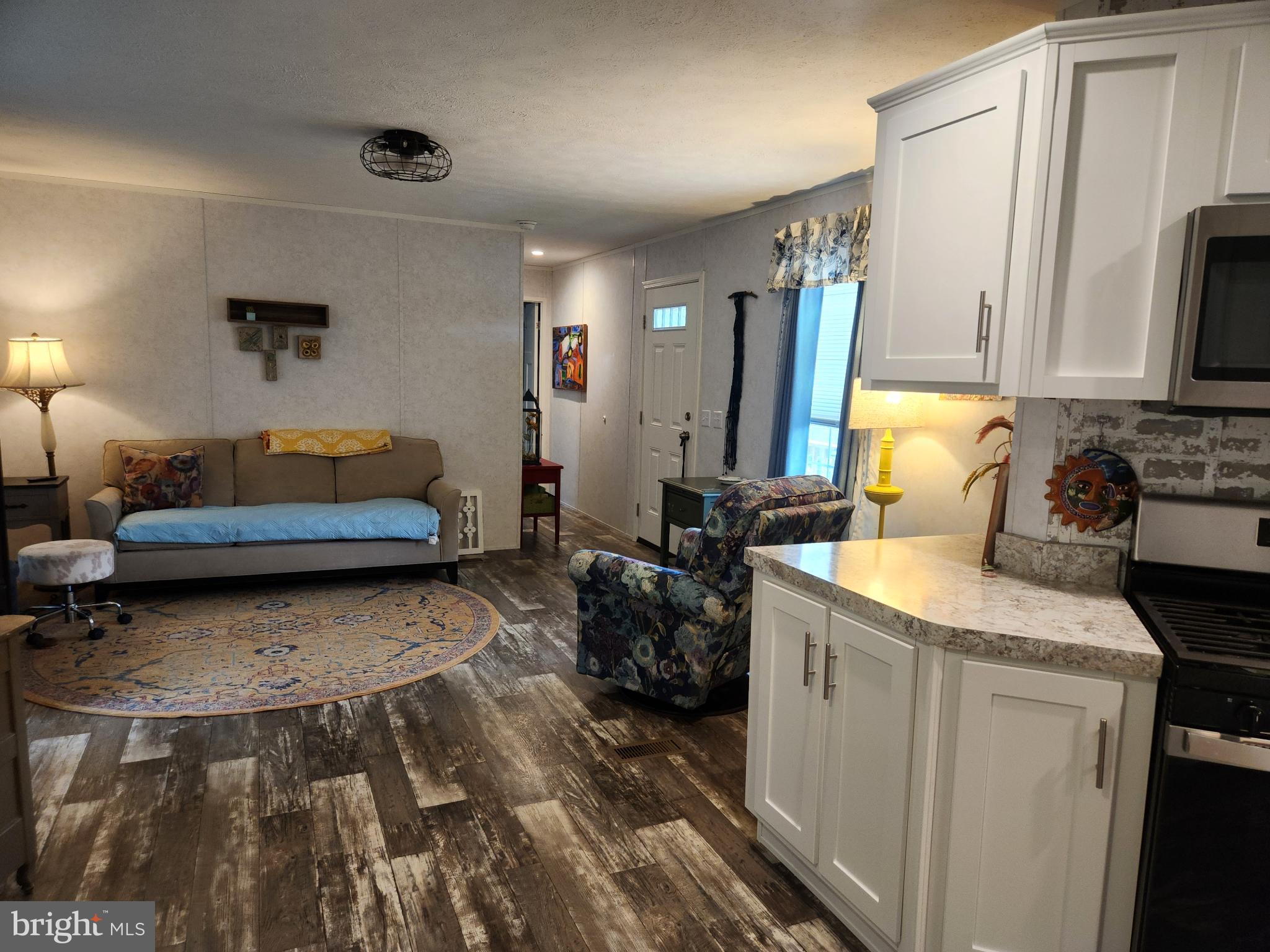 16 Mill Street York, PA 17406 - Photo 13 of 29 a bedroom with furniture a bed and a flat tv screen on the dresser