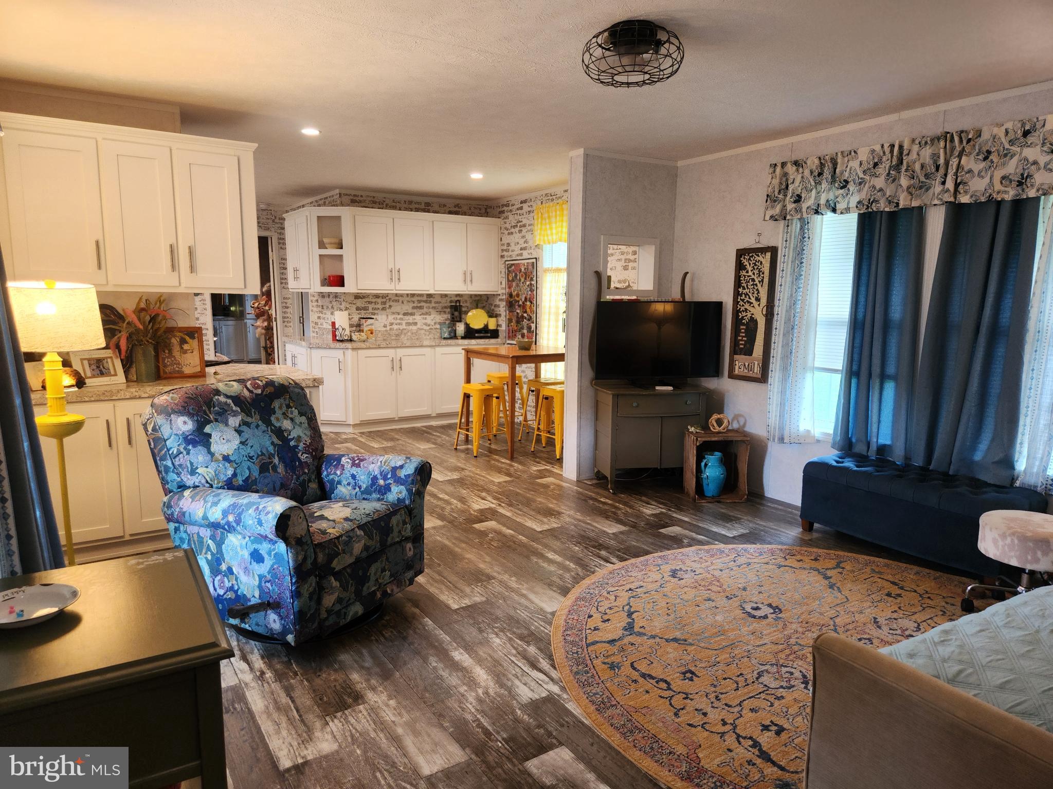 16 Mill Street York, PA 17406 - Photo 3 of 29 a living room with furniture and a flat screen tv