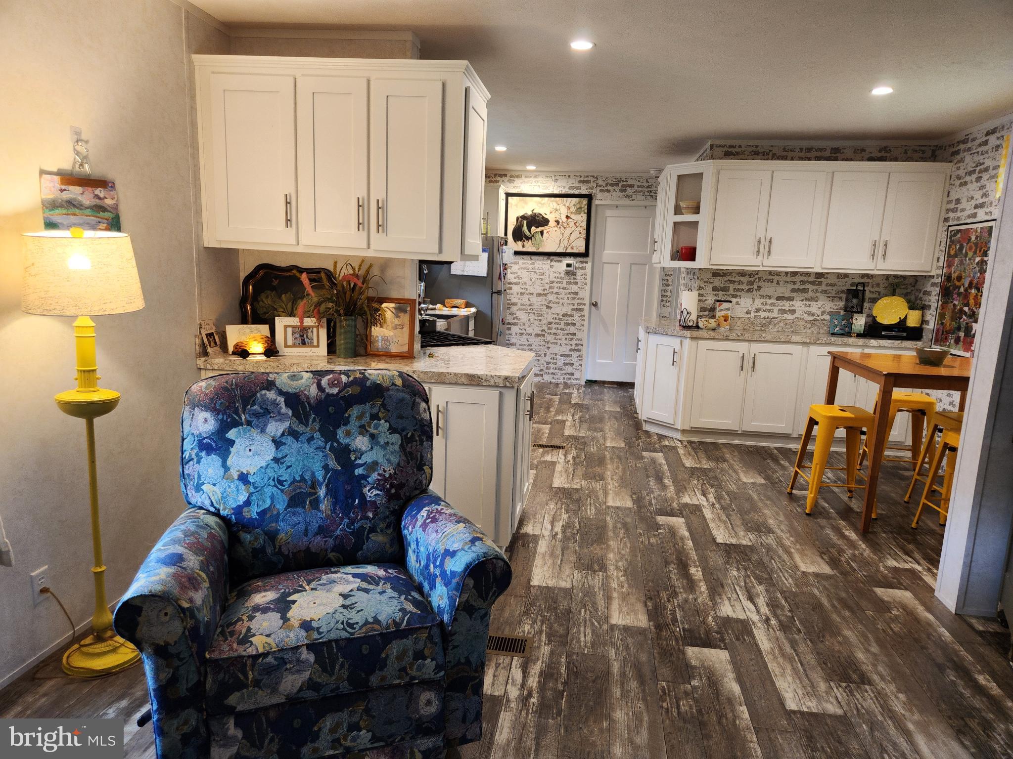 16 Mill Street York, PA 17406 - Photo 5 of 29 a kitchen with stainless steel appliances granite countertop a refrigerator sink and cabinets