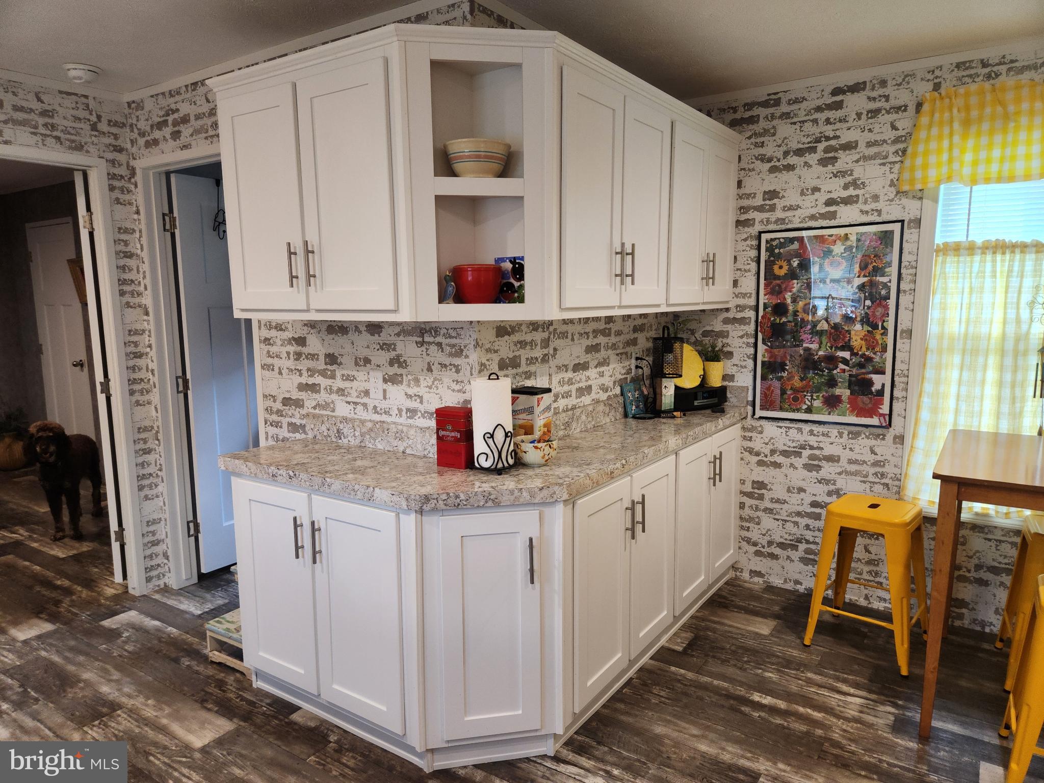 16 Mill Street York, PA 17406 - Photo 10 of 29 a kitchen with stainless steel appliances granite countertop a sink stove and cabinets