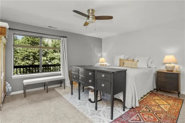 a workspace with furniture and a window