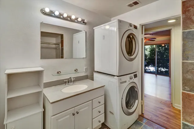a utility room with dryer and washer